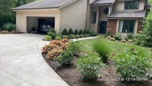 Local Fort Wayne spring cleanup and fresh mulch landscaping in front yard.
