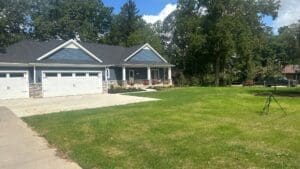 New construction home with completed lawn and landscape installation