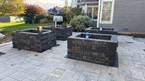 Completed backyard paver patio with seating area in Fort Wayne Indiana
