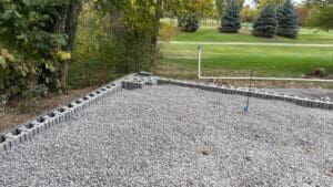 Paver patio base installation and construction work in progress in Fort Wayne